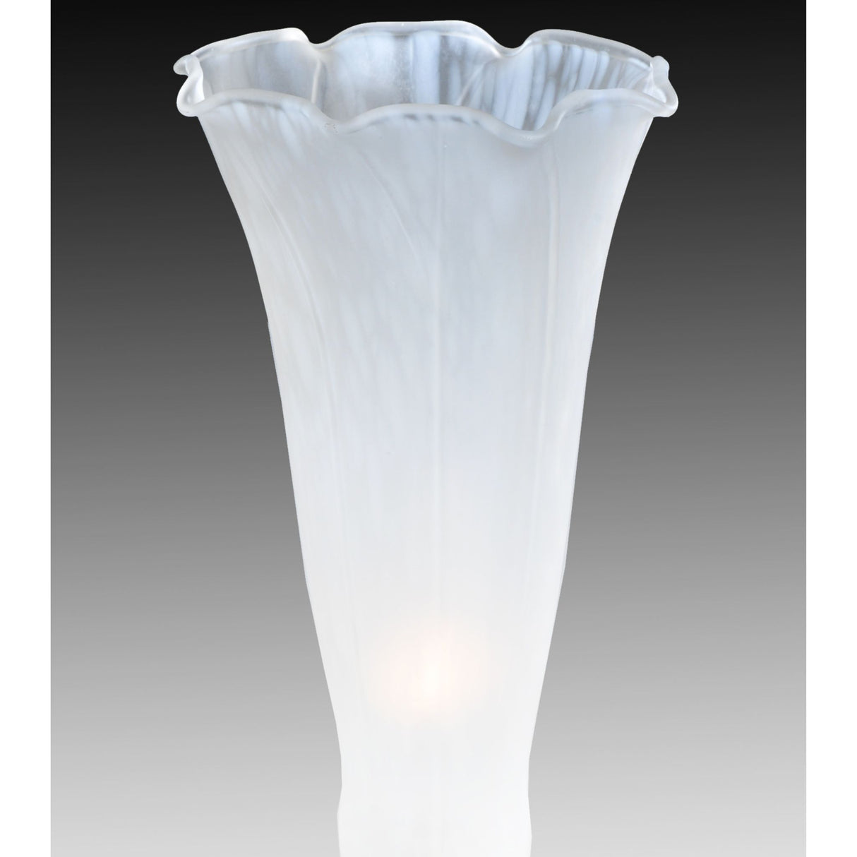 White art glass lily shade in soft ambient lighting.