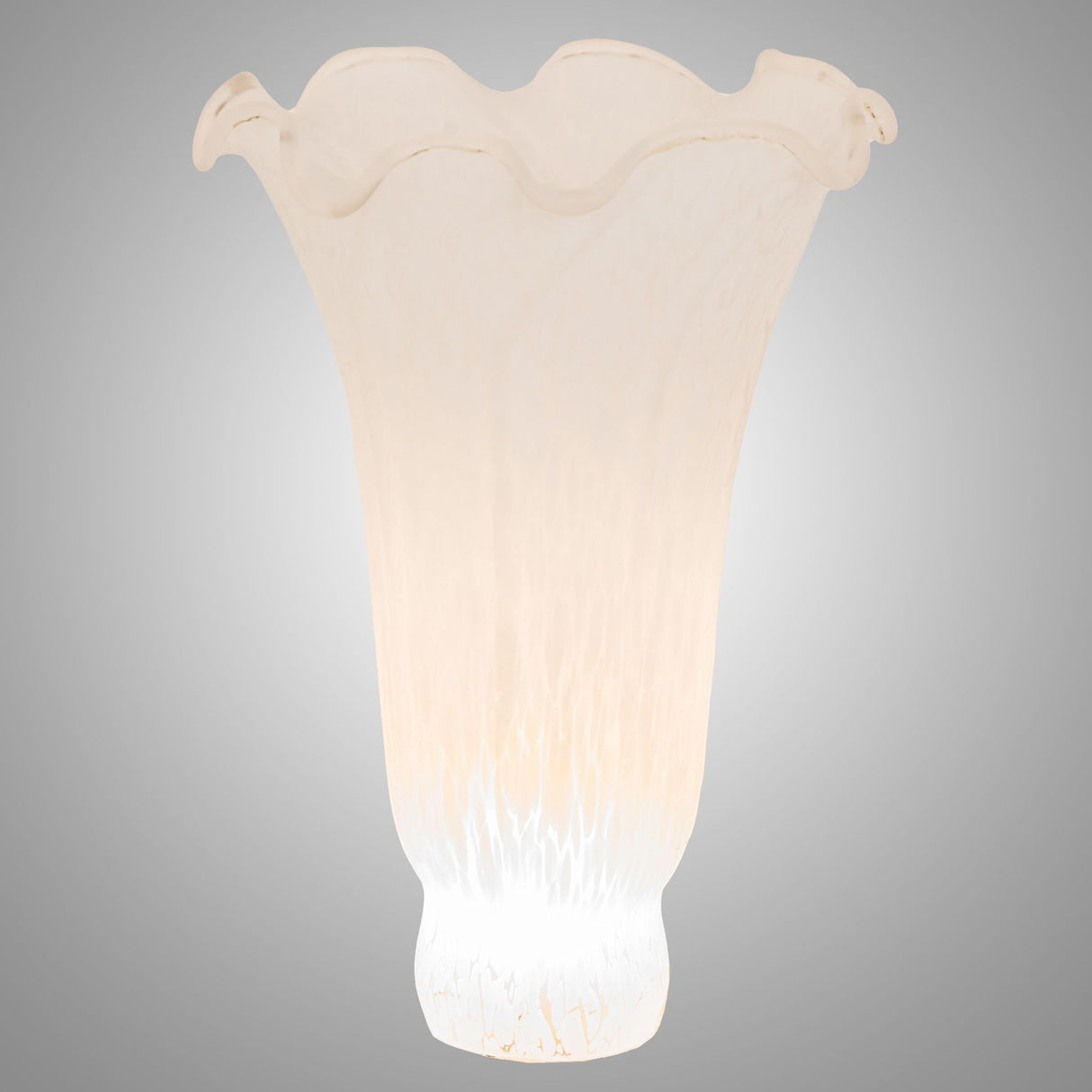 Lit view of white Pond Lily glass shade softly illuminated.