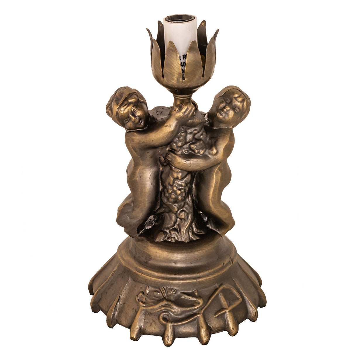 Base view of antique brass cherub lamp base with ornate carvings.