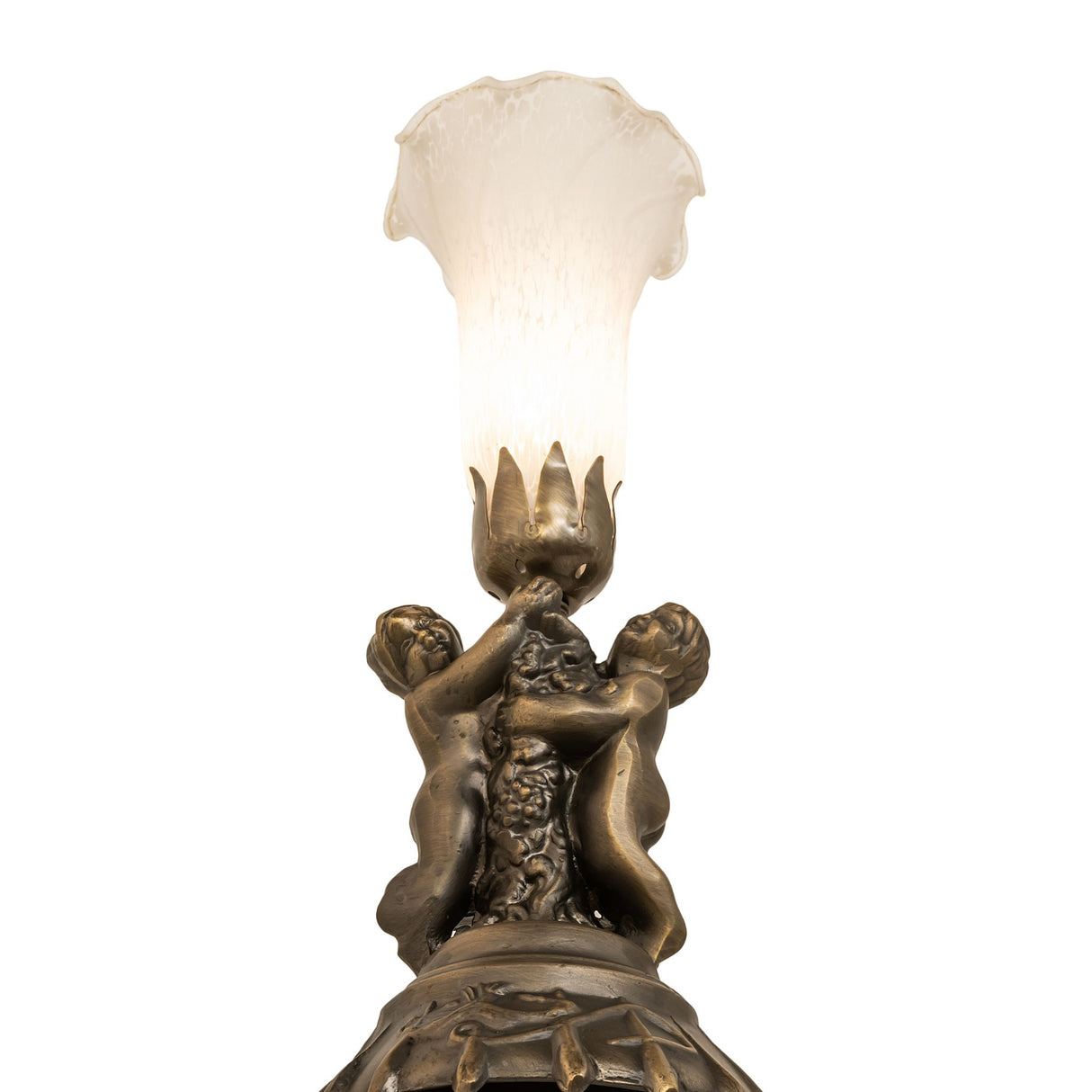 Bottom angle view of cherub lamp with glowing pond lily shade.
