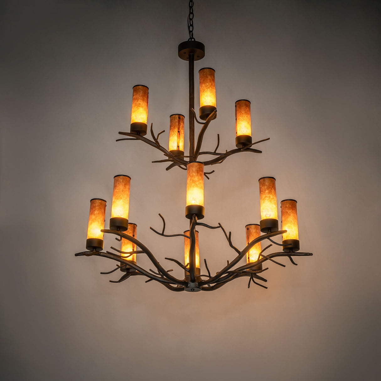 Winter Solstice 12 light chandelier installed in room showing ambient lighting effect.