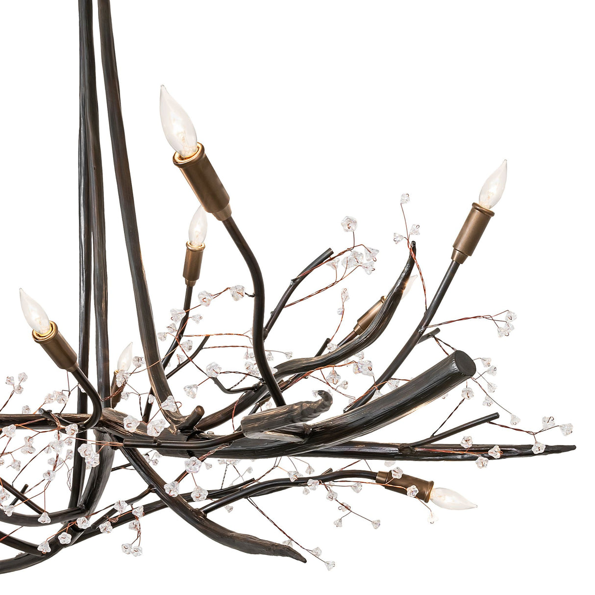 Close-up detail of chandelier branches with crystal buds and candle socket.