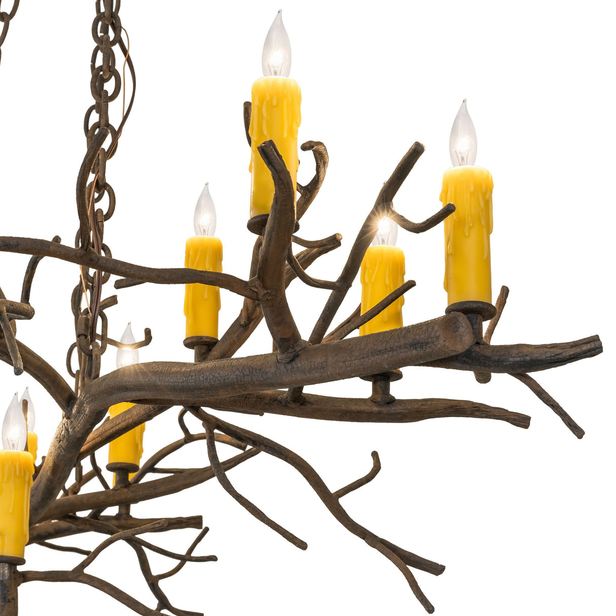 Close-up branch view highlighting organic twig textures and candle details.