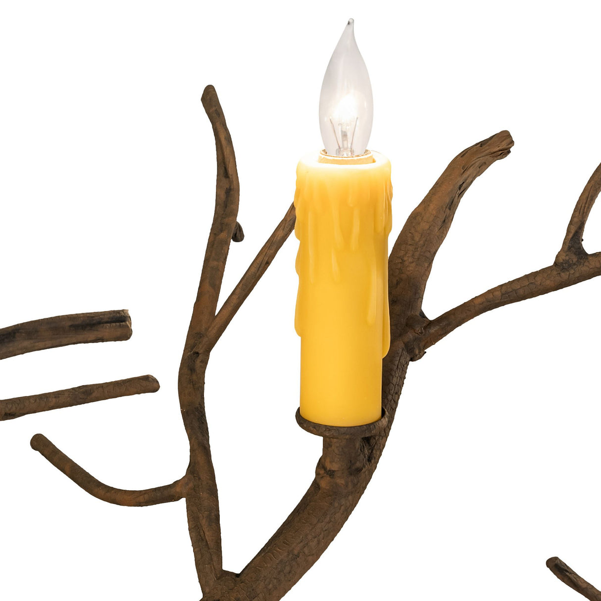 Close up lit candle detail on Winter Solstice chandelier branch.