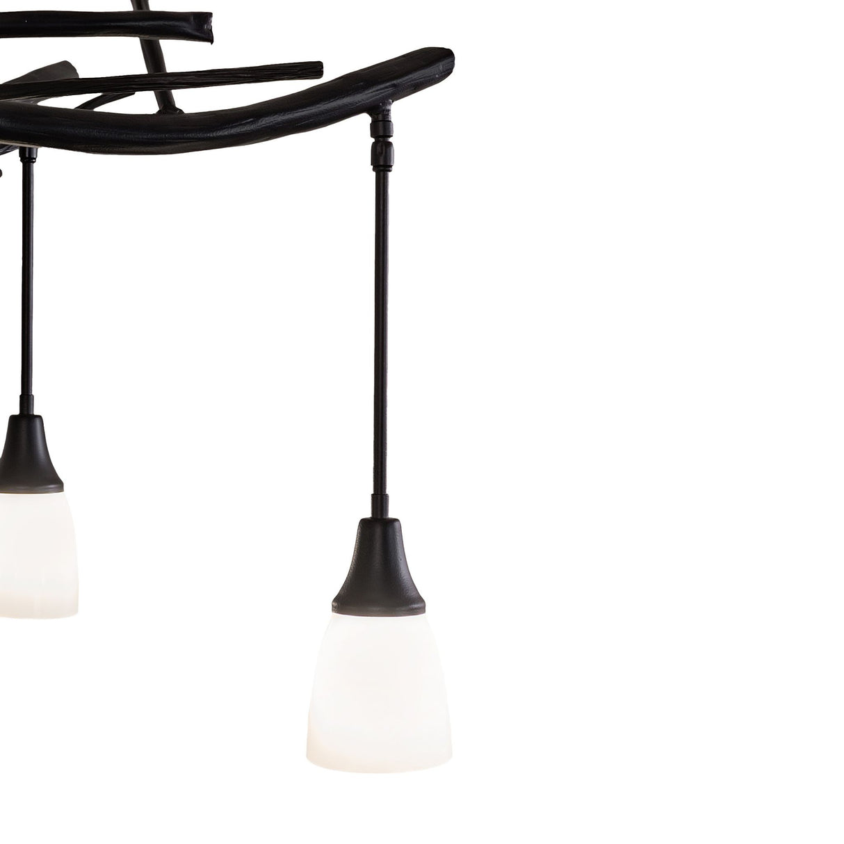 Close-up detail of white art glass shade on black satin metal socket holder.