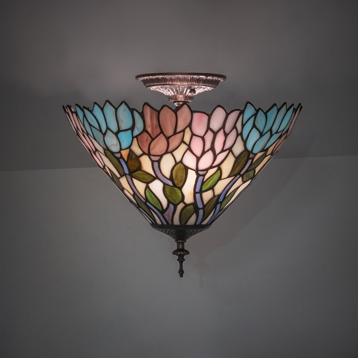 Ceiling-mounted Wisteria flushmount in ambient lighting.