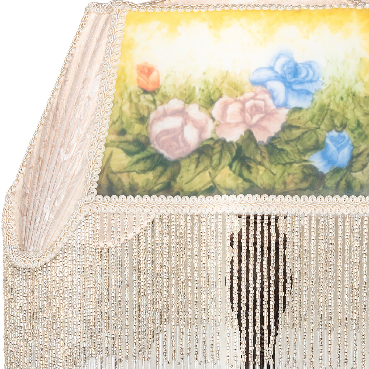 Detailed view of reverse-painted roses on the lamp.