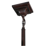 Close-up view of bronze ceiling mount and chain detail.