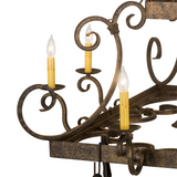 Detailed view of candlelight arms and scroll accents.