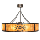 Side profile highlighting ADK emblem and warm mica glow.