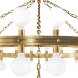 Albion chandelier close-up showing globe bulbs, brass ring rivets, and chains.
