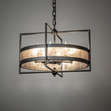 Aldari chandelier providing warm ambient lighting in a modern interior setting.