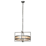 Full view of chandelier featuring metal outer frame, drum shade, and chain suspension.