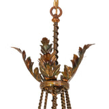 Acanthus leaf crown detail in burnished transparent gold finish.