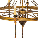 Close-up of decorative ring with rope trim and candle holders.
