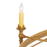 Detailed view of candle-style bulb and holder on chandelier showing refined craftsmanship.
