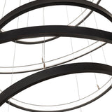 Close-up of textured black LED ring detail on Anillo cascading chandelier.
