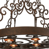 Close-up of Dior chandelier’s hand-forged scroll design.