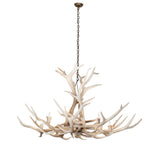 Full view of Elk antler chandelier suspended from an overhead chain.