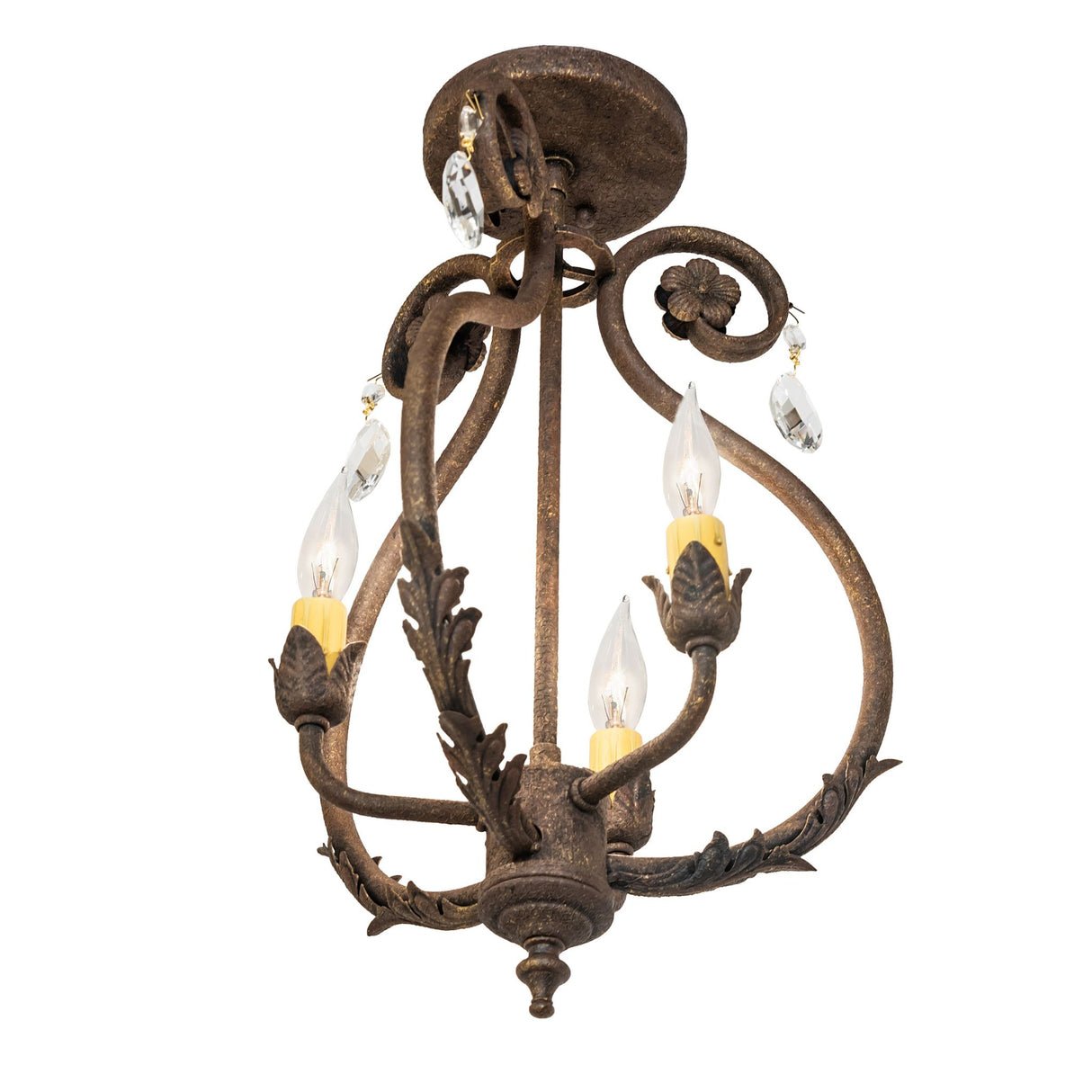 Bottom angle view of chandelier showing tapered finial and underside of scrolled framework.