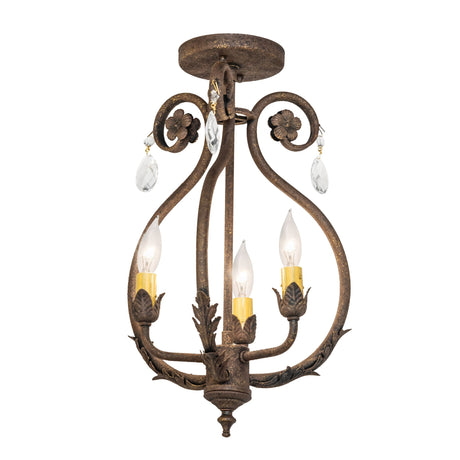 Lit view of chandelier with antiquity finish, scrolled arms, crystal drops, and ivory candle-style bulbs.