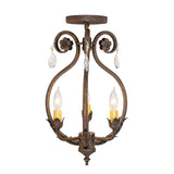Side view of chandelier highlighting curved arms, leaf detailing, and hanging crystal drops.