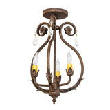 Unlit view of chandelier showing ornate scrollwork, acanthus leaves, and faceted crystal ornaments.