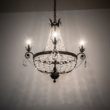 Antonia 4-light crystal chandelier illuminated in ambient room setting.