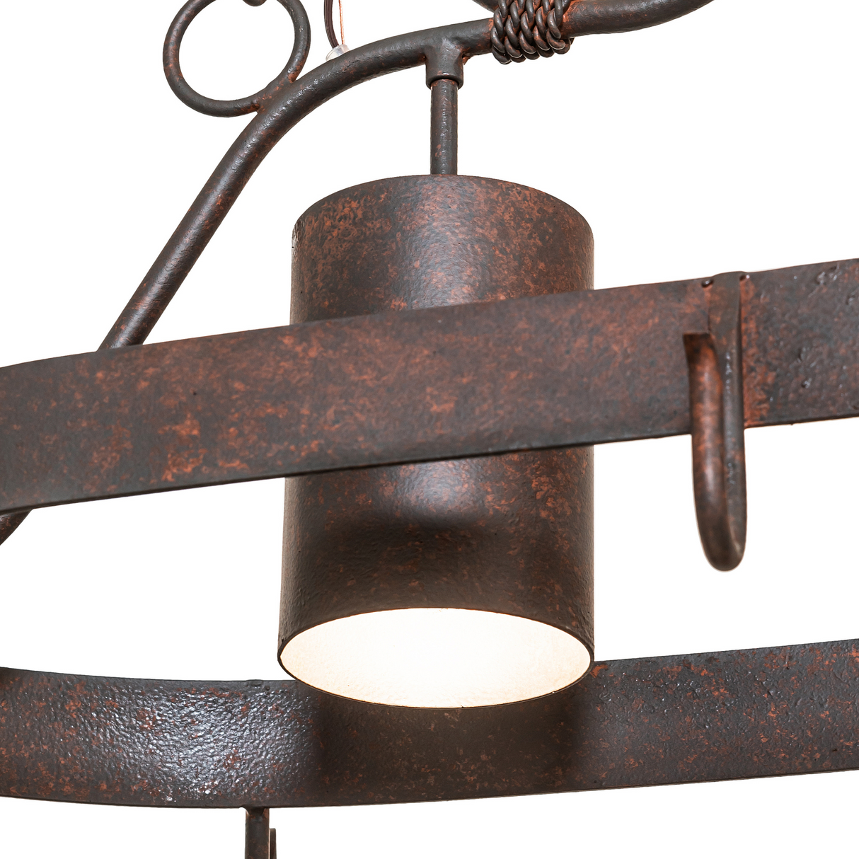 Close-up of light fixture and rustic finish texture.