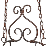 Close-up of scrollwork and chain details.