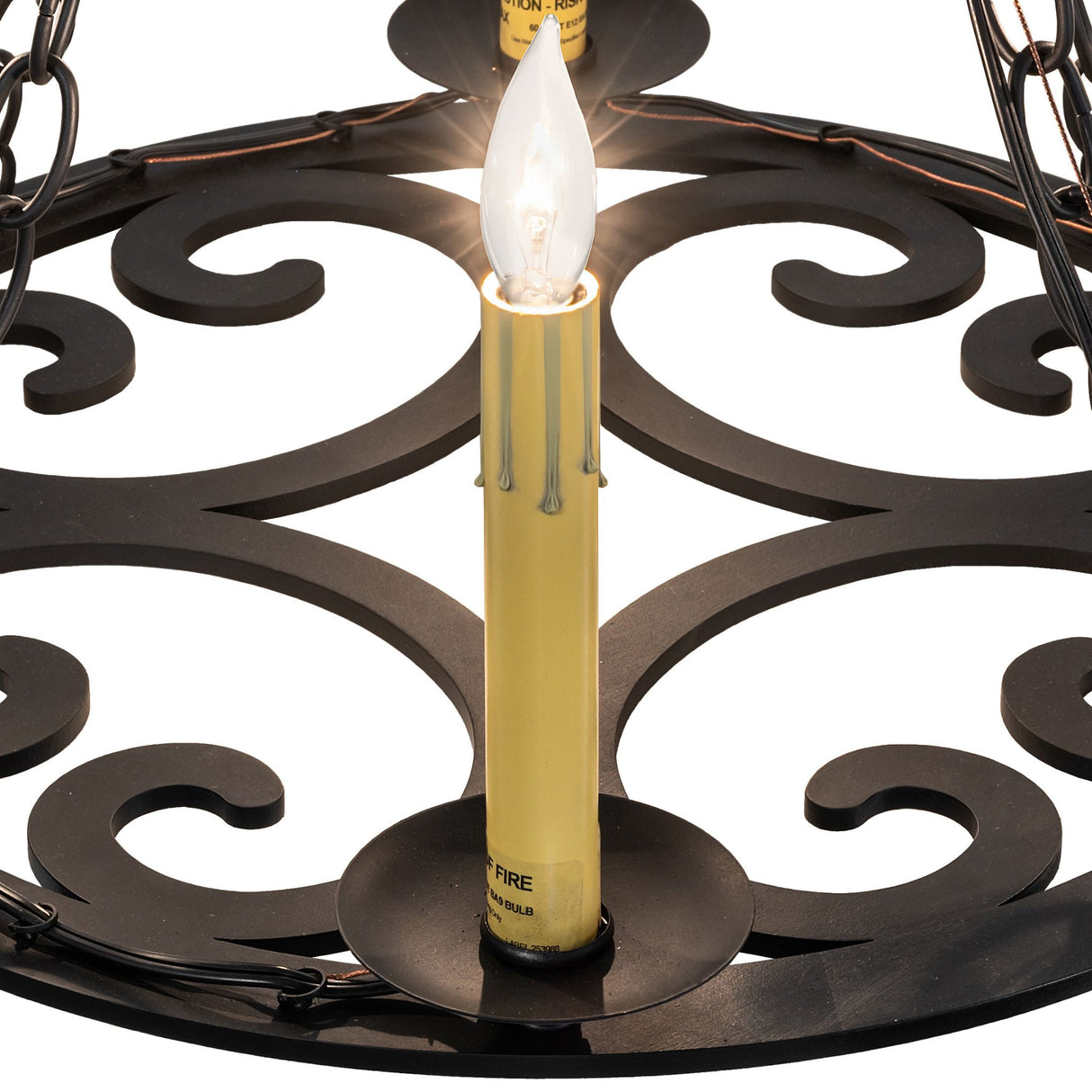 Closeup of Ashley chandelier candle-style light detail.
