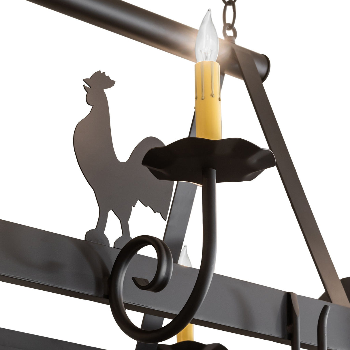 Closeup of rooster detail on barn animals chandelier.