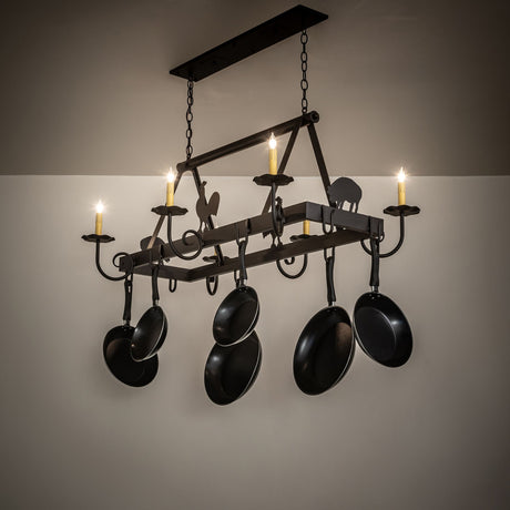 Barn animals chandelier glowing in rustic kitchen space.