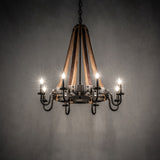 Barrel Stave chandelier providing warm ambient lighting in dark room.