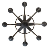 Direct bottom view revealing circular metal frame, radial supports, and central orb finial detail.