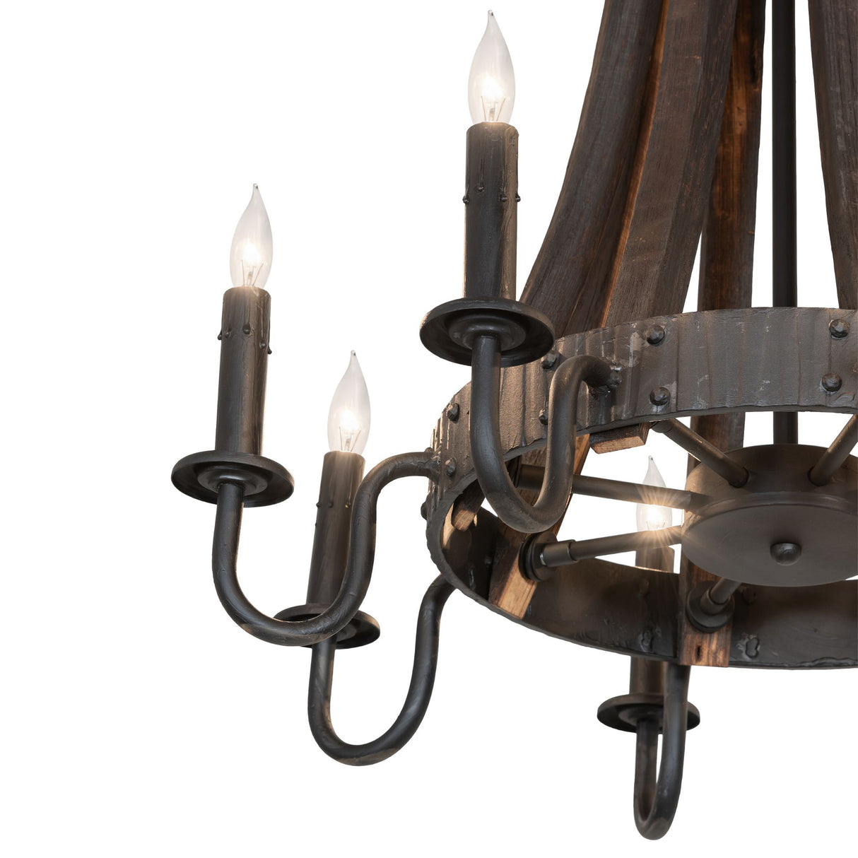 Detail closeup of chandelier showing forged metal arms, wood grain, and candle socket finish.