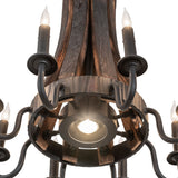 Close-up view of integrated downlight surrounded by wood staves and metal arms.