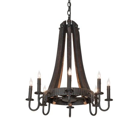 Lit view of chandelier featuring charred wood staves, black metal arms, and glowing candle lights.