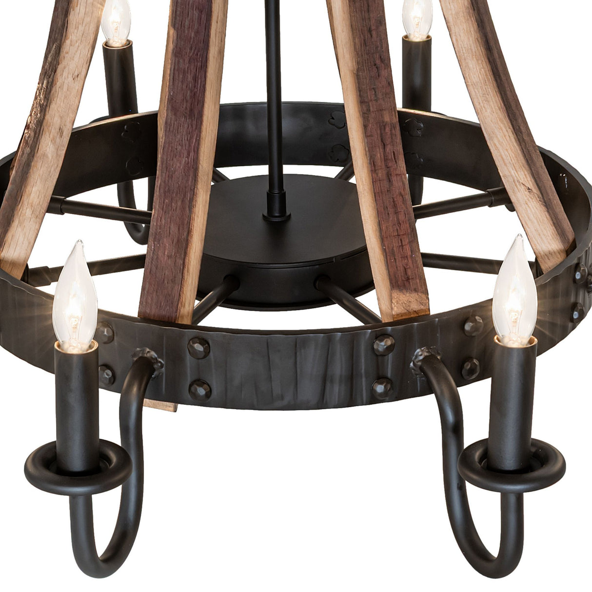 Detail of natural wood staves with dark metal hardware, lit view.