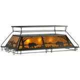 Front angled view of Bear at Lake pot rack chandelier glowing warm amber.