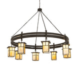 Lit view of Beartooth T Mission chandelier with eight beige glass lantern shades.