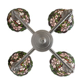 Bottom view of 4 light chandelier showing symmetrical arm layout and glass shades.