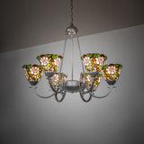Begonia 6-light chandelier with illuminated stained glass floral shades in an interior setting.