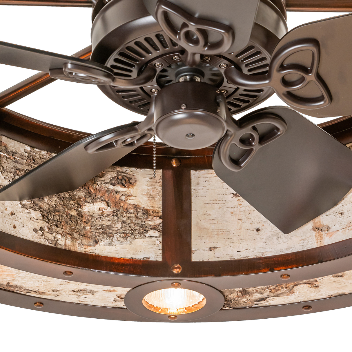 Close-up of fan hub and downlight detail with rustic bronze finish.