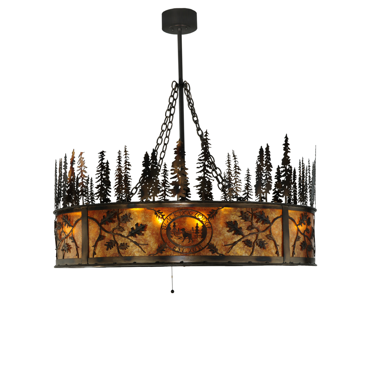 Side view of illuminated Black Dog Lodge Chandel-Air with forest silhouette. 