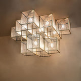 Ambient view in a large interior with geometric brass cubes and crystal bead accents.