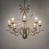 Ambient view of Bordeaux 8 light chandelier shown illuminated in an interior setting.