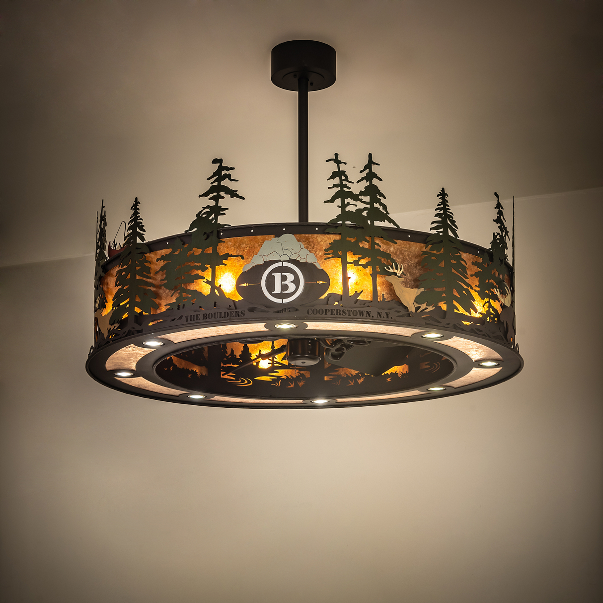 Boulders Personalized Chandel-Air glowing warmly in ambient room lighting.