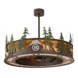Unlit front angled view showing forest silhouettes and engraved logo.