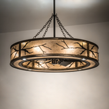 Ambient view showing warm mica glow and rustic branch design.